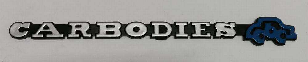 Carbodies boot lid badge